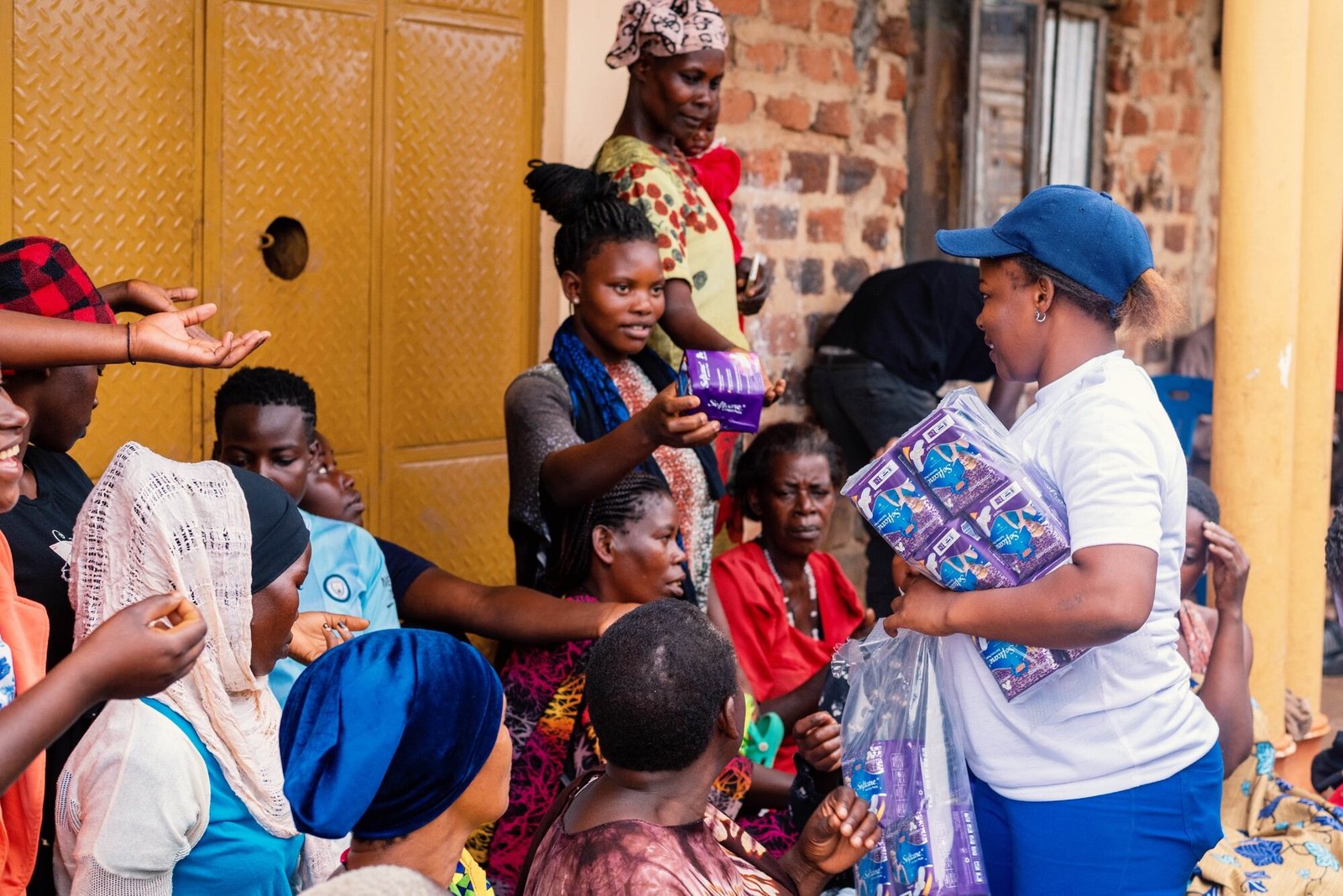 WVF team distributing menstrual products